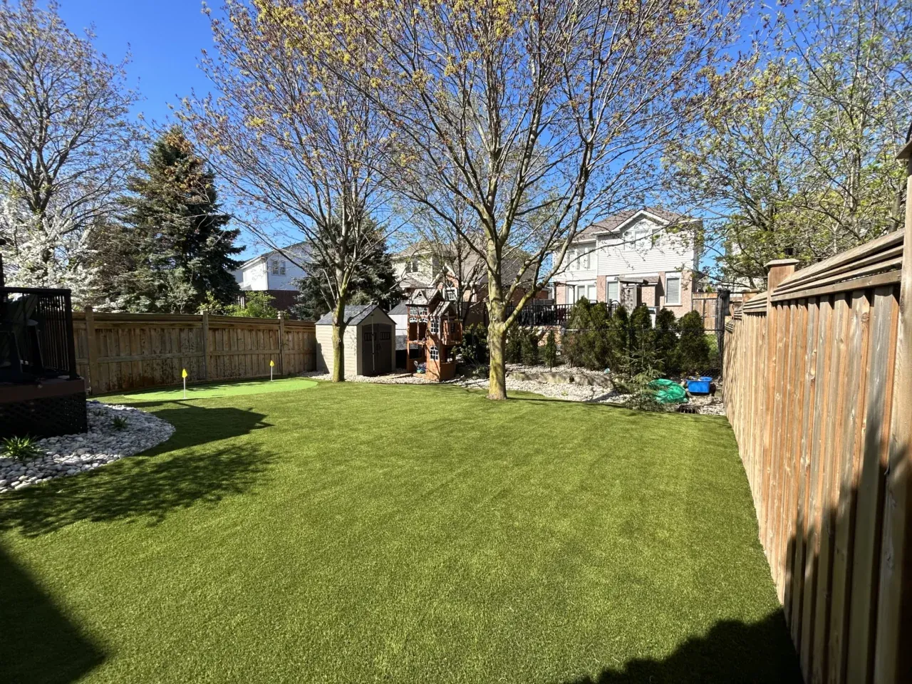 Artificial grass installed in an Aurora backyard