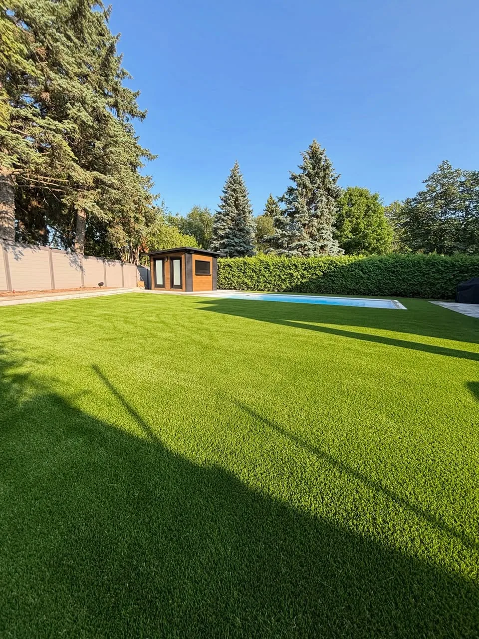 Wide artificial grass lawn installation in Aurora